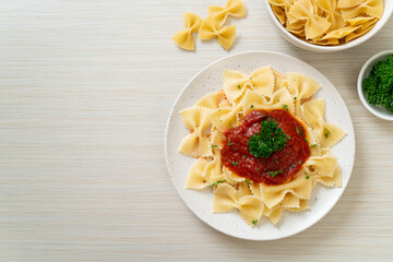 farfalle pasta in tomato sauce with parsley