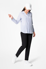 Woman in blue shirt and pants with hat casual wear fashion full body