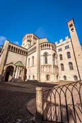 Fototapeta premium The Medieval San Vigilio Cathedral (Duomo di Trento, 1212-1321) in Romanesque and Gothic style, Trento downtown, Trentino-Alto Adige, Italy, Europe.