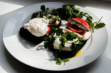 Breakfast plate with sandviches and green stock photo