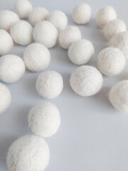 White felt balls. Merino wool