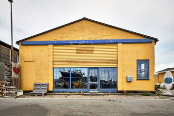 small yellow warehouse exterior in scandinavia