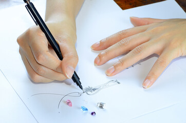 Sketches designing pendant jewelry