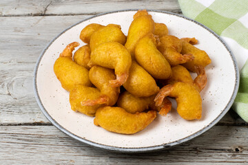 Fried prawns in tempura served on a plate