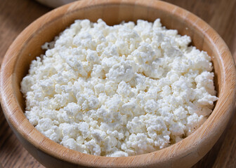 Homemade cottage cheese in  bowl.