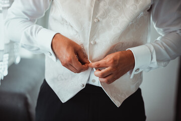 The groom is getting ready for the wedding