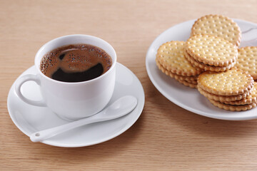 Sandwich cookies and coffee