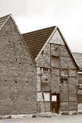 Fototapeta na wymiar Alte Fachwerk Fassade in Lippetal Lippborg in sepia fotografiert