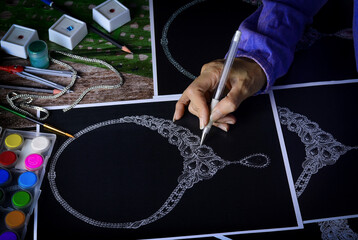 The sketch is designing jewelry pendant.