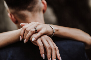 bride and groom holding hands