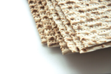 Traditional Jewish kosher matzo for Passover. Set with Passover matzos on white background. Pesach celebration
