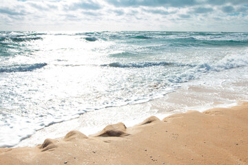 Sea beach with bright yellow sand