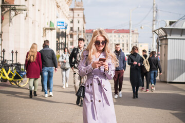 Lifestyle concept, a beautiful girl in the city walks