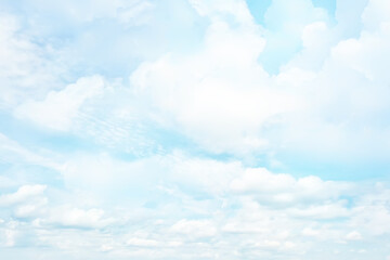 white clouds on blue sky background, abstract seasonal wallpaper, sunny day atmosphere