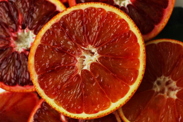 Red orange halves and slices, close up