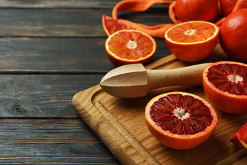 Concept of citrus with red oranges on wooden table