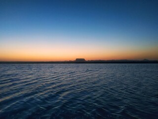 Naklejka premium sunset over the lake