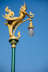 Fototapeta na wymiar lamp pole with angel statue
