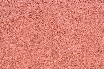Fototapeta premium Ocher color texture of the plaster on the exterior walls