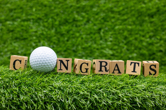 Golf Graduation with congrats word on green grass