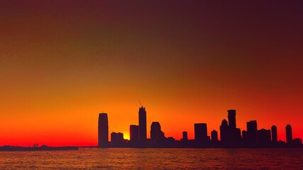 Obraz na płótnie Canvas city skyline at sunset