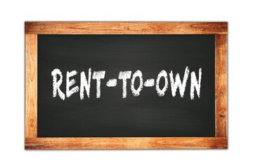 Fototapeta premium RENT-TO-OWN text written on wooden frame school blackboard.