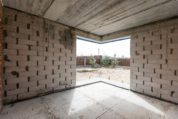 Obraz premium Interior construction of housing project patched without painting applied.