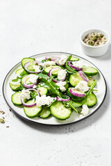 Spring vegan raw detox cucumber salad. Space for text.