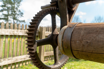 Old rusty gearwheel on a windmill