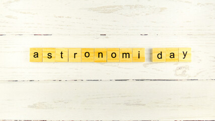 Astronomy Day.words from wooden cubes with letters