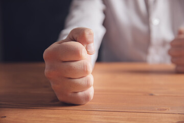 male fists on the table