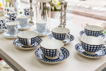 set of blue tea mugs with blue pattern