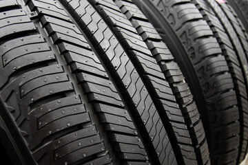 Symmetrical directional tire tread pattern for car. Tire surface texture