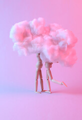 Love concept. Two puppets are kissing in the cloud. Pink blue neon light. Valentine's Day....