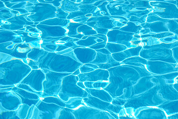 Turquoise water texture of a swimming pool or beach