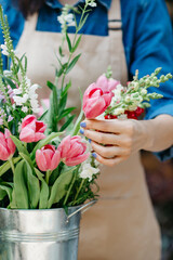 Florist make spring bouquet, outdoors business, shopping and opening after covid-19