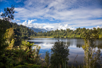 Fototapeta na wymiar Scenic view of Lake Mapourika in New Zealand