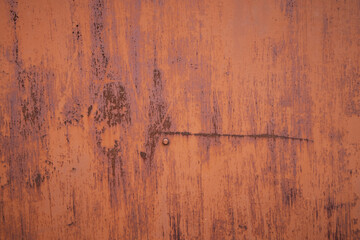 Rusty old metal texture with remnants of the paint. Grungy background for any design. 