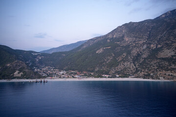 Panoramic view of coastal city in the mountains.