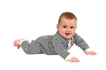  baby crawling on the floor looking at camera on white background