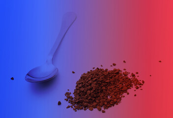 Metal spoon with granulated coffee in neon light