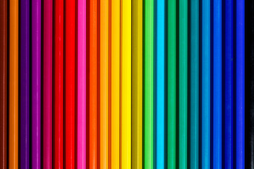 Obraz premium Set of colored pencils on white table