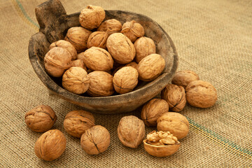 fresh and organic walnuts on plate