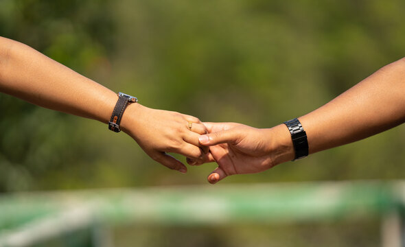 Couple Holding Each Others Hands