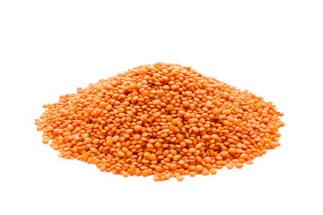 Heap of red lentils not cooked isolated on white background