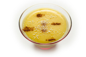 Milk and banana pudding. With coconut and cinnamon.