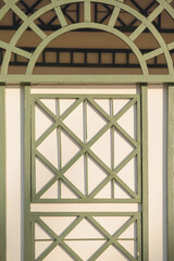 Exterior building with geometric panels in the sunlight. Architectural lifestyle travel photography