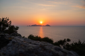 Obraz premium Palmarola, sunset from the island of Ponza or Pontine Islands in the Tyrrhenian Sea near Terracina