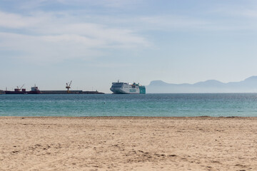 Mallorca, Spain - March, 2021: Balearia ferry ship arriving in port of alcudia in mallorca during...