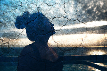 Portrait Silhouette Woman with Cracked Desert Earth Face Skin. Deprivation Concept.